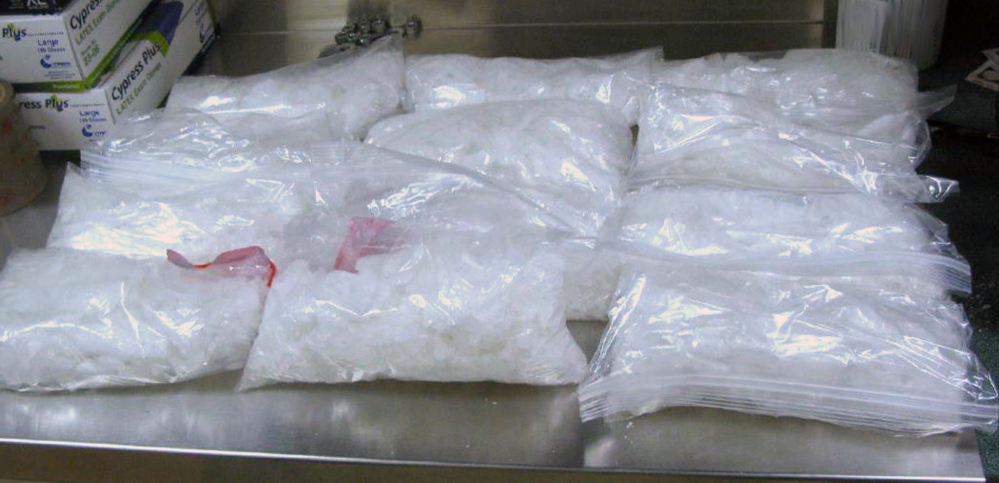 Twelve packages of methamphetamine were confiscated after a border agent saw the drone flying over the border fence.