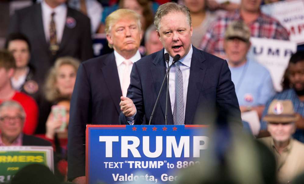 NASCAR Chairman and CEO Brian France, right, supported Donald Trump in his bid to become president, but hasn't commented about the white nationalist rally in Virginia.