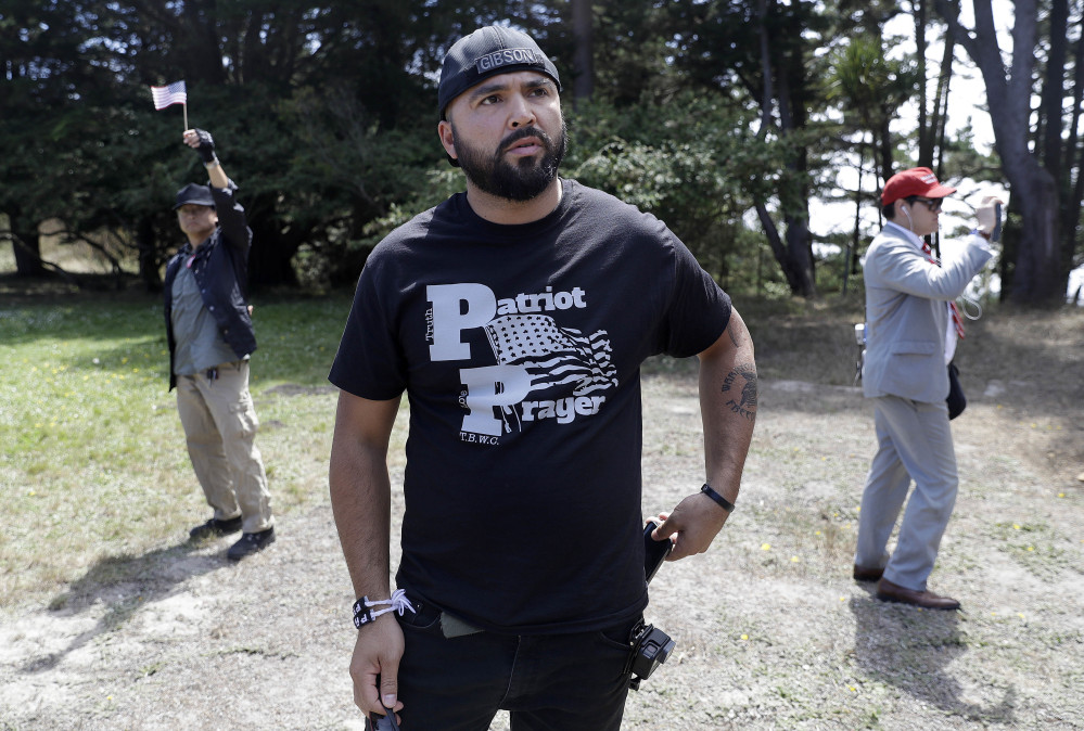 Joey Gibson of Patriot Prayer speaks at a news conference in Pacifica, Calif., on Saturday.