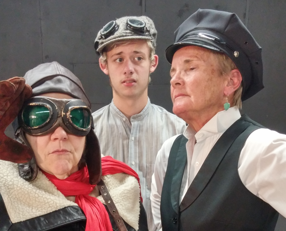 From left, Sallie Chase as Ivo Prazzoli, Ricky Brewster as Billy Bunders and Penny Davis-Dublin as the narrator in the Daytime Players’ “Billy Goes to War.”