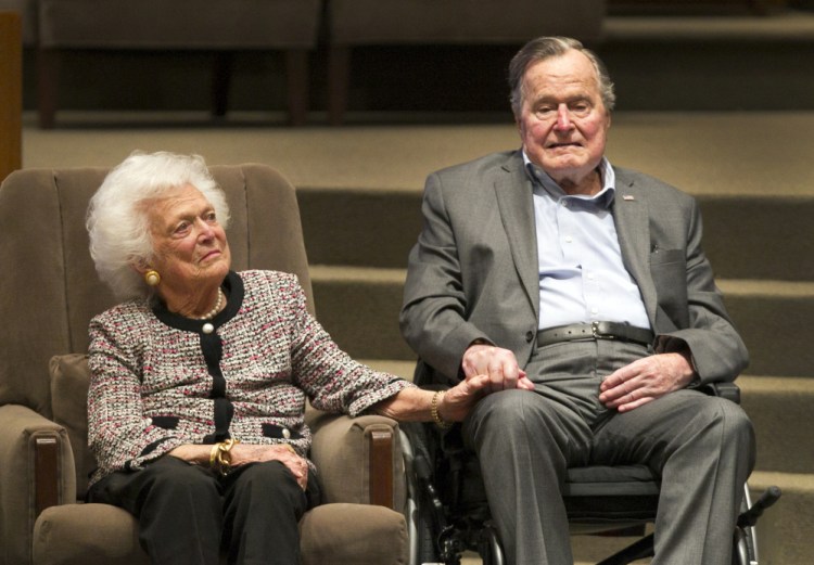 Former President George H.W. Bush and former first lady Barbara Bush attend a ceremony in Houston in March. They sent words of encouragement and support to those affected by Hurricane Harvey on Monday.