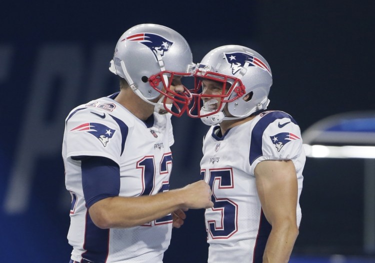 Tom Brady, left, celebrates a touchdown with wide receiver Chris Hogan in the first half of Friday night's preseason game against the Detroit Lions. Hogan is in position to be Brady's go-to receiver this season.