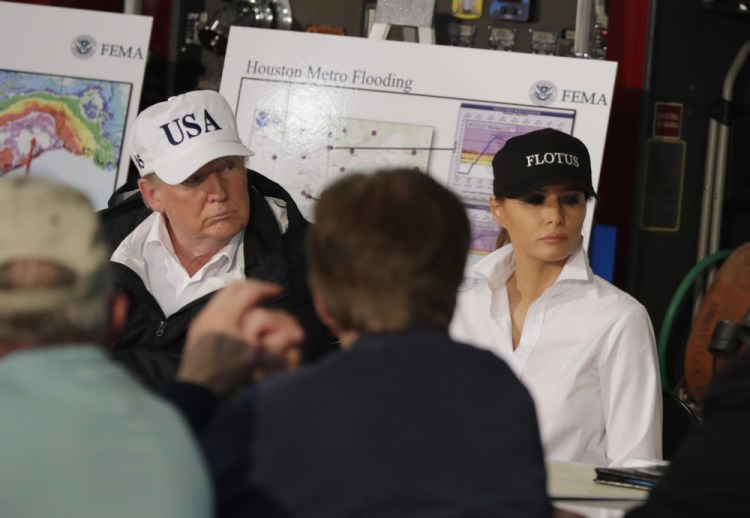 President Trump and first lady Melania Trump participate in a briefing on Harvey relief efforts on Tuesday at Firehouse 5 in Corpus Christi, Texas.