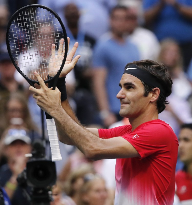 Roger Federer reacts Thursday after defeating Mikhail Youzhny in five sets to advance to the third round of the U.S. Open. Federer was forced to go five sets in each of the first two rounds for the first time in a Grand Slam event.