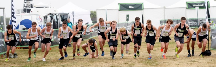 The boys take off at the start of the Beach to Beacon high school mile on Friday.