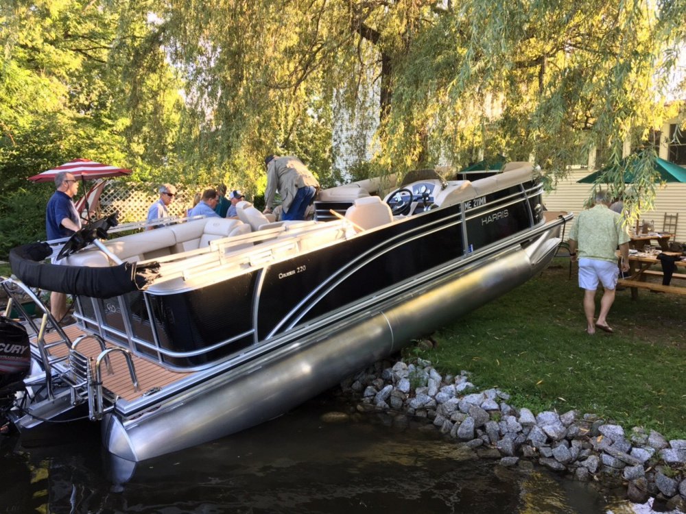 A pontoon boat crashed Wednesday evening into the back of the Village Inn on Great Pond in Belgrade.