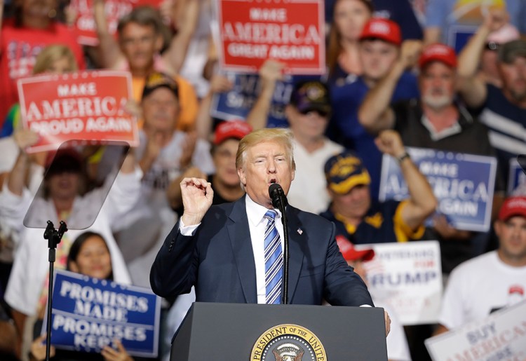 President Trump speaks during a rally Thursday  in Huntington, W.Va. Trump overwhelmingly won the state in the November election, partly due to his promises to revive a slumping coal industry.