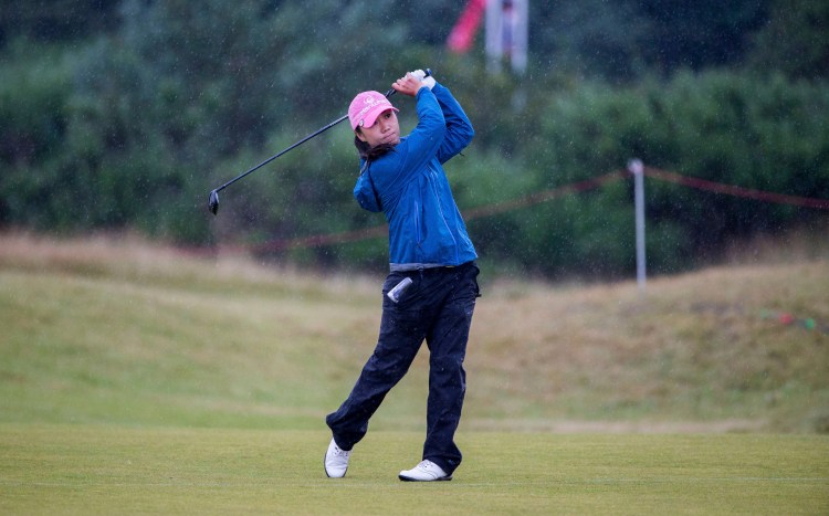 In-Kyung Kim of Korea plays her approach shot at the 18th hole during day two of the Women's British Open at Kingsbarns Golf Links in St Andrews Scotland on Friday.