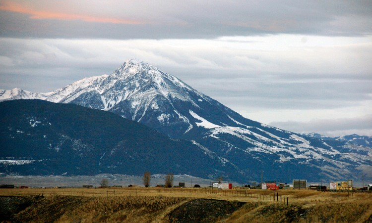 Emigrant Peak towers over the Paradise Valley in Montana north of Yellowstone National Park in November. U.S. Interior Secretary Ryan Zinke says he wants to speed up a proposal to block new gold mining claims on public lands near Yellowstone National Park and will consider blocking other types of mining.