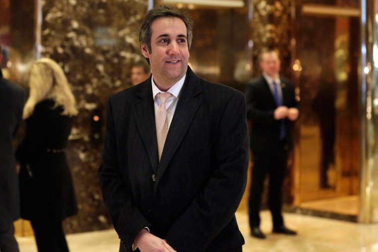 Michael Cohen, a top executive of the Trump Organization, sought the help of an aide to Russian President Valdimir Putin to advance Donald Trump's business interests in Russia during the presidential campaign, documents show.