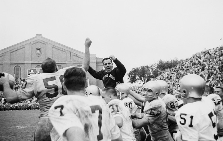 In this Sept. 26, 1964, file photo, Notre Dame coach Ara Parseghian celebrates his first victory with the school as he is carried on the shoulders of his players after their 31-7 victory over Wisconsin, in Madison.