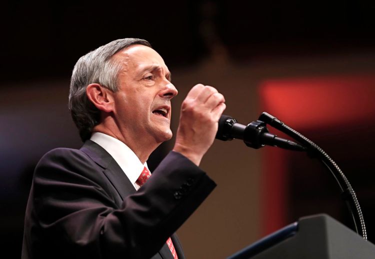 Pastor Robert Jeffress of the First Baptist Dallas Church  introduces President  Trump during the Celebrate Freedom event at the Kennedy Center in Washington on July 1, 2017. "A Christian writer asked me, 'Don't you want the president to embody the Sermon on the Mount?' " he saiys, referring to Jesus' famous sermon. "I said absolutely not."