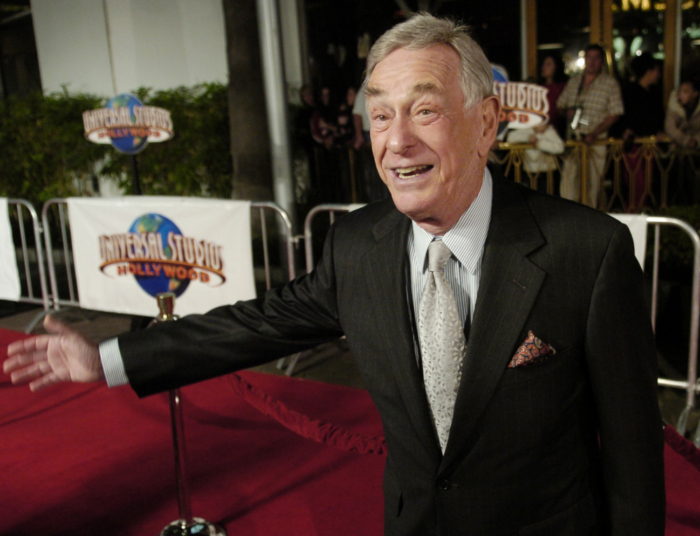Comedian Shelley Berman poses at the premiere of the film "Meet the Fockers" in Universal City, Calif., in 2004. Berman died Friday at home in Bell Canyon, Calif., at 92.