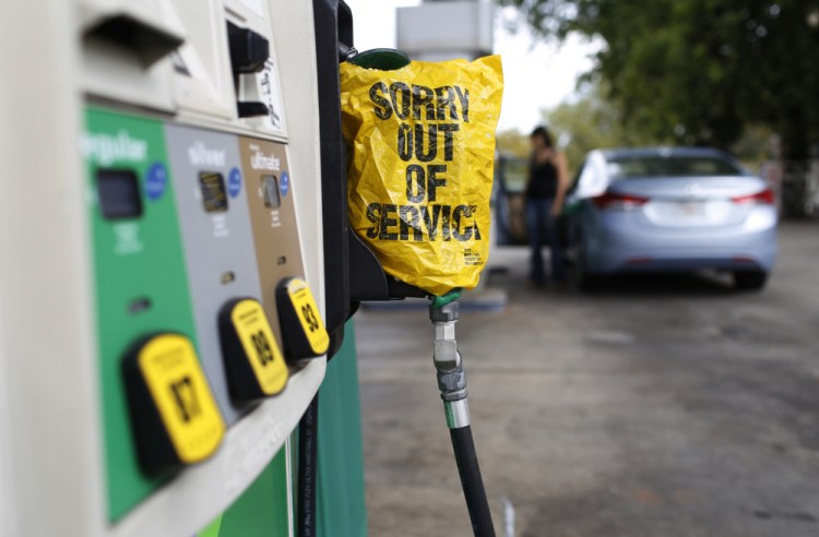 Some pumps, like this one at a gas station in Athens, Ga., and others in parts of Texas went dry Friday. More than one-fifth of the nation's supply has been affected by flooding that hit refineries on the Texas coast.