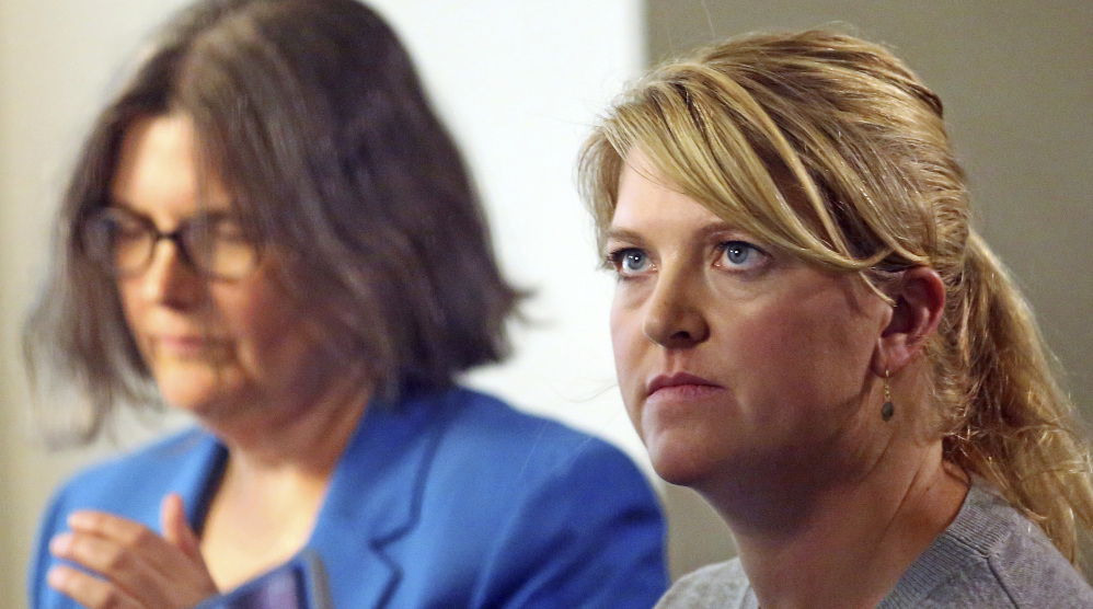 Nurse Alex Wubbels, right, looks on during an interview while her attorney Karra Porter looks on, Friday, Sept. 1, 2017, in Salt Lake City. Wubbels followed hospital policy and advice from her bosses when she told Salt Lake City police Detective Jeff Payne that he could not get a blood sample without a warrant or consent from the patient, according to Porter. The police department is making changes after Payne dragged a screaming Wubbels out of the hospital in handcuffs when she refused to allow blood to be drawn from the unconscious patient. (AP Photo/Rick Bowmer)