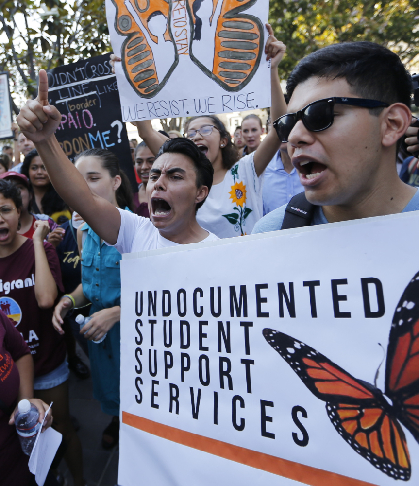Undocumented students join a rally in support of the Deferred Action for Childhood Arrivals in Los Angeles Friday.