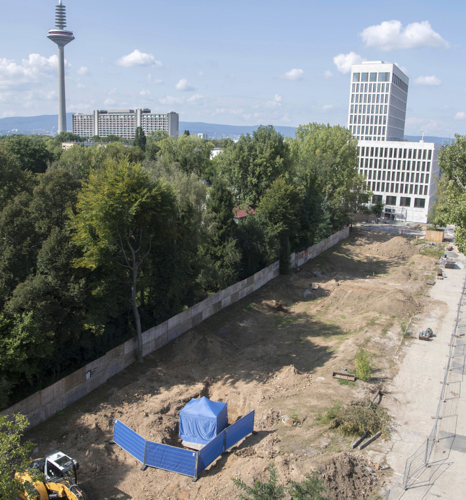 A blue tent covers an unexploded 1.8-ton World War II-era bomb in Frankfurt, Germany, on Friday. The British bomb is supposed to be defused on Sunday.