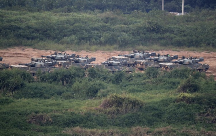 South Korean K-1 tanks are seen in Paju, South Korea, on Sunday. North Korea announced it detonated a thermonuclear device Sunday in its sixth and most powerful nuclear test to date, a big step toward its goal of developing nuclear weapons capable of striking anywhere in the U.S. The North called it a "perfect success" while its neighbors condemned the blast immediately.