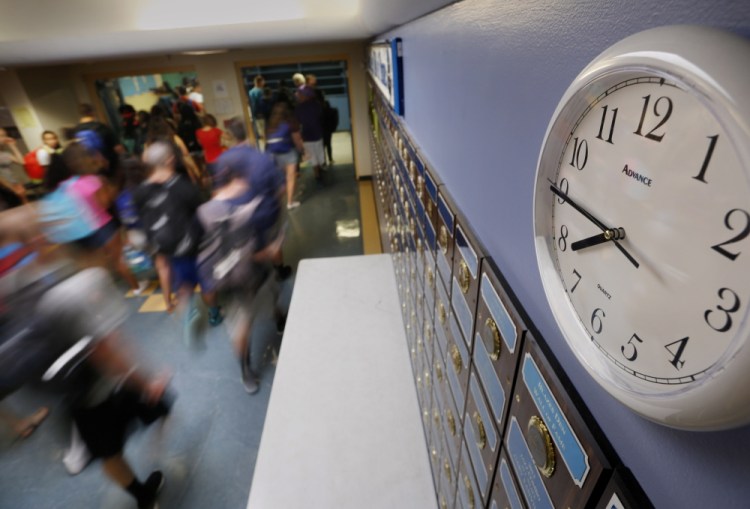 Westbrook High School, above, pushed back its start time from 7:30 a.m. to 7:50 a.m. several years ago, but many other Maine secondary schools start at 7:30 a.m. or earlier, despite decades of research indicating the academic and health benefits of a later start to the school day.