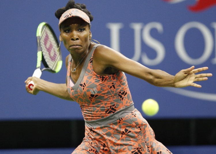 Venus Williams prepares to hit a forehand Tuesday night to Petra Kvitova during the quarterfinals of the U.S. Open. Williams won in three sets and will meet Sloane Stephens in the semifinals.