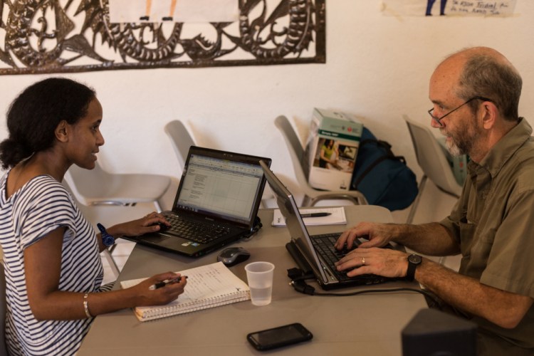 Konbit Sante's Country Director Tezita Negussie, left, works with Executive Director Nate Nickerson in Haiti. Negussie left Portland in January. Nickerson is headed there Wednesday.