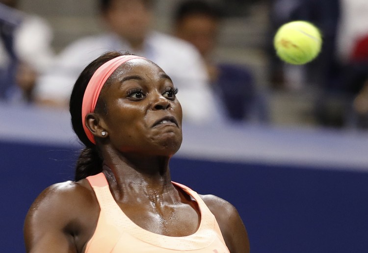Sloane Stephens returns a shot from Venus Williams during the semifinals of the U.S. Open on Thursday in New York. Stephens rallied in the third set to win the match and advance to the final.