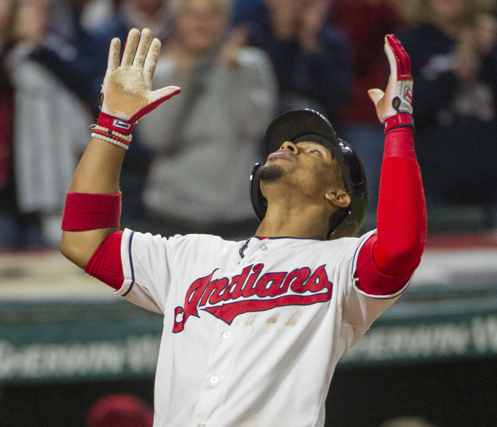 Cleveland's Francisco Lindor celebrates after hitting a solo home run in the Indians' 3-2 win over Baltimore on Sunday, their 18th straight victory.