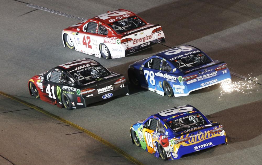Martin Truex Jr.'s car trails sparks in Turn 2 of the Richmond International Raceway in Richmond, Va., Saturday night, but what really set him off was having a potential victory snatched from him because of a late caution that might not have been warranted.