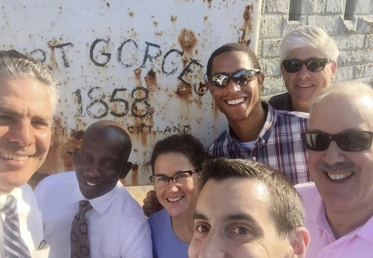 A Facebook photo posted by Councilor Pious Ali, shows, from left to right, Ethan Strimling, Ali, Belinda Ray, Justin Costa, Spencer Thibodeau, Nicholas Mavodones and David Brenerman at Fort Gorges on Monday.