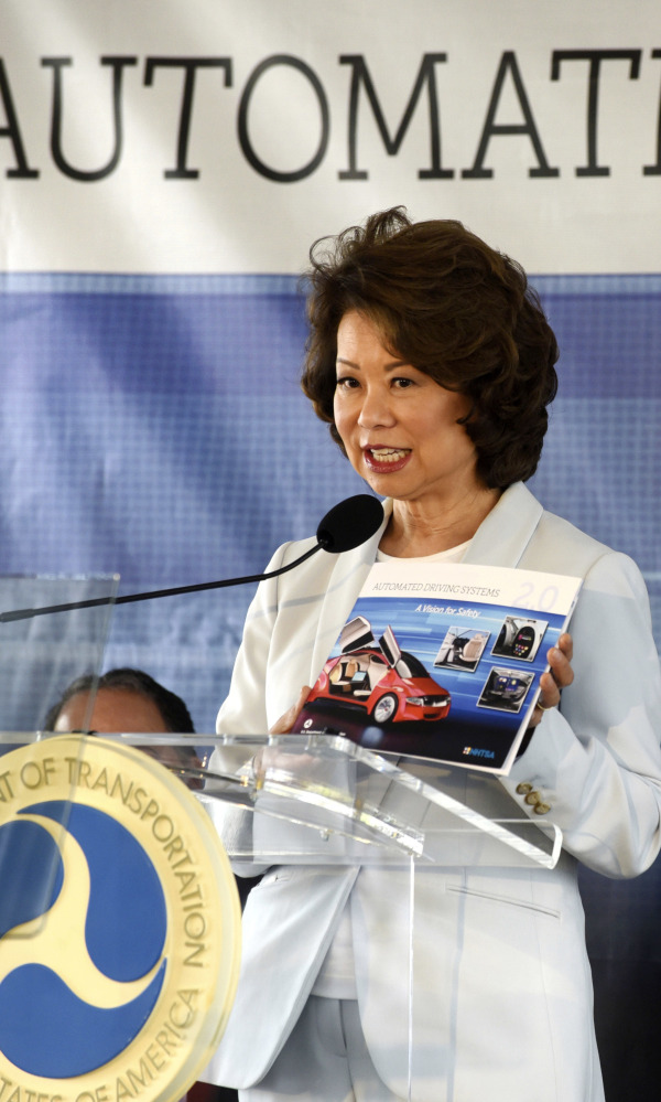 At a testing facility Tuesday in Michigan, Transportation Secretary Elaine Chao said updated safety guidelines for self-driving cars seek to clear barriers for automakers and tech companies while maintaining driver safety.