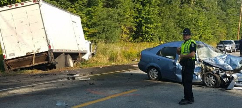 Police investigate Tuesday morning after a box truck swerved to avoid a pedestrian on Route 201 in Skowhegan but hit him and a car traveling in the other direction.