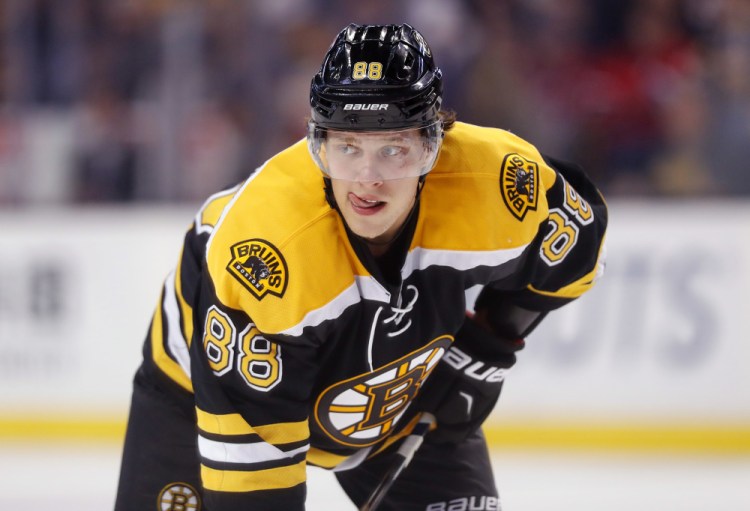 The Boston Bruins signed forward David Pastrnak to a six-year, $40 million contract on Thursday.