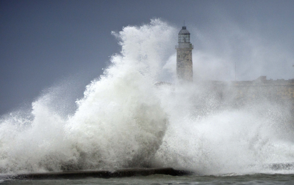 Waves crash into El Morro after the passing of Hurricane Irma in Havana, Cuba, last Sunday. The powerful storm ripped roofs off houses, collapsed buildings and flooded hundreds of miles of coastline.