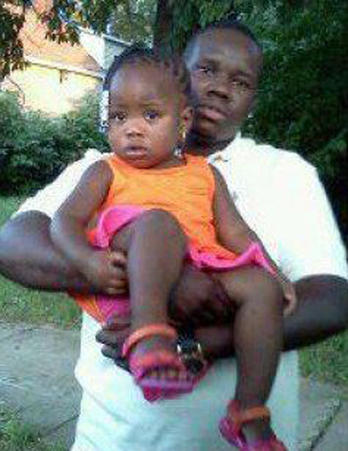 Family photo shows Anthony Lamar Smith holding his daughter Autumn Smith. He was killed by police in 2011.