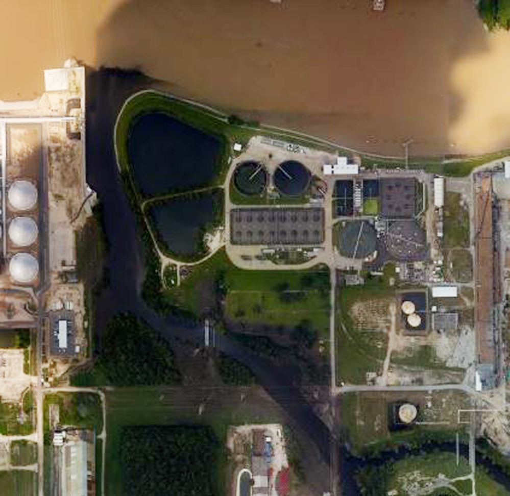 Aerial photo from NOAA shows floodwaters surrounding the U.S. Oil Recovery Superfund site outside Houston flowing into the San Jacinto River. The EPA is still assessing damage.
