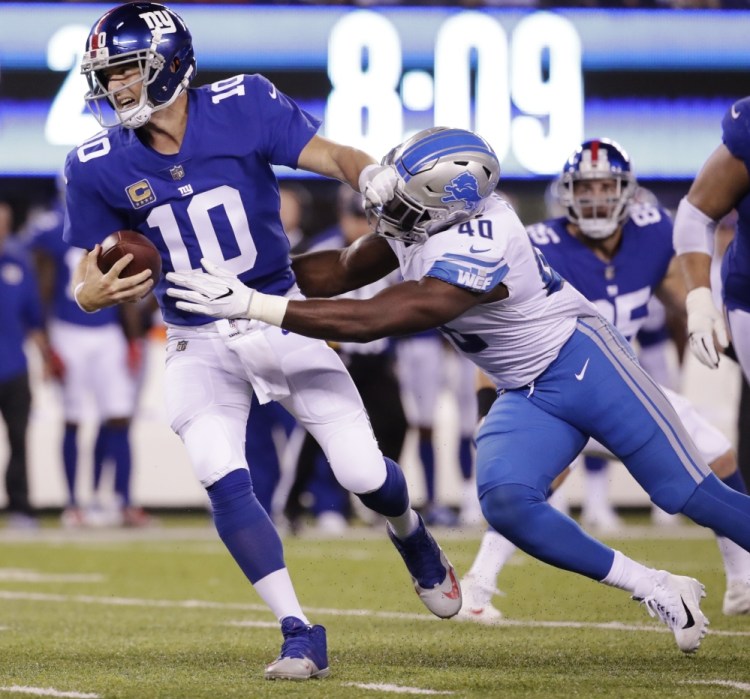 Giants quarterback Eli Manning has been sacked eight times in his team's first two games, including five sacks Monday night in a 24-10 loss to the Lions.