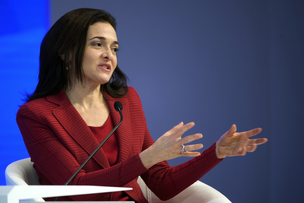 FILE - In this Wednesday, Jan. 18, 2017, file photo, Facebook Chief Operating Officer Sheryl Sandberg speaks during a plenary session in the Congress Hall during the annual meeting of the World Economic Forum, in Davos, Switzerland. Sandberg says Facebook is tightening policies and tools that let businesses target advertisements to its 2 billion users. (Laurent Gillieron/Keystone via AP, File)
