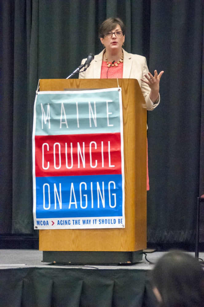 Julie Sweetland, vice president for strategy & innovation at the FrameWorks Institute, gives the keynote address during Maine Council on Aging event on Wednesday at the Augusta Civic Center.