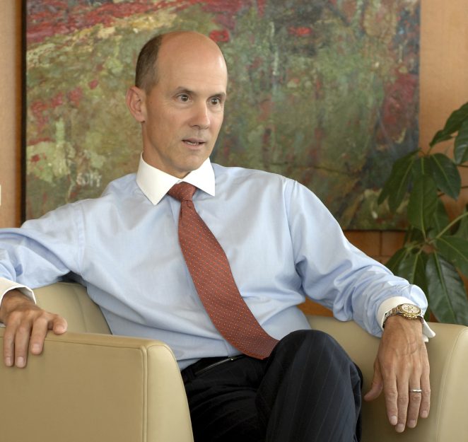 Equifax CEO Richard Smith poses for a photo at the Equifax headquarters in Atlanta. State and federal authorities are proposing tougher regulations against Equifax and the entire credit monitoring industry after the company announced that personal information like Social Security numbers of about 143 million Americans was exposed. 