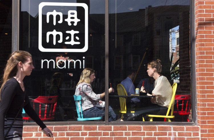 Marisa Polk and Jeanette Baum, right, take a lunch break from their jobs at CIEE to eat at nearby Mami on Fore Street in Portland.