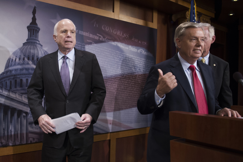 Sen. John McCain, R-Ariz., left, broke with longtime friend Lindsey Graham, R-S.C., center, on Graham's bill to repeal Obamacare. President Trump took to Twitter on Saturday morning to complain about McCain's position.