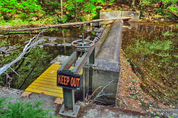 The fish ladder on the far side of the dam at Sheepscot Pond is closed in May and June.