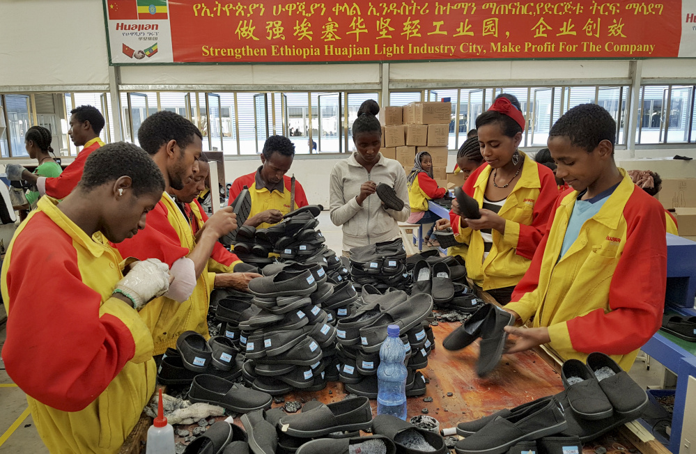 Workers sort shoes in January at a Chinese factory in Addis Ababa, Ethiopia. The Ganzhou Huajian International Shoe City Co. has been used by the Ivanka Trump  brand.