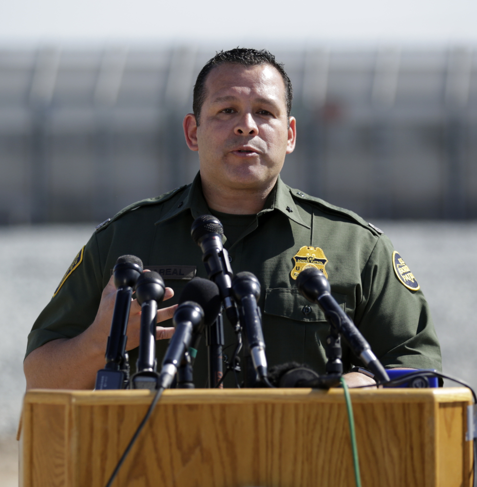 Roy Villarreal, of the U.S. Border Patrol, speaks at a news conference at the San Diego-Mexico border near Tijuana on Tuesday.l