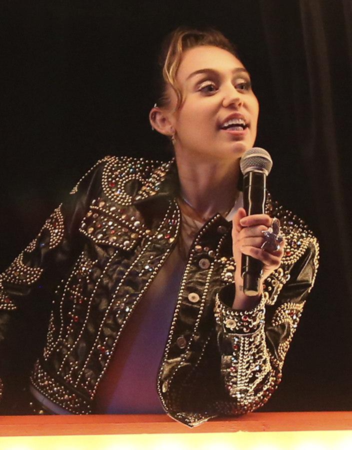 Miley Cyrus takes questions from the audience at a private concert event Friday in Nashville, Tenn.
