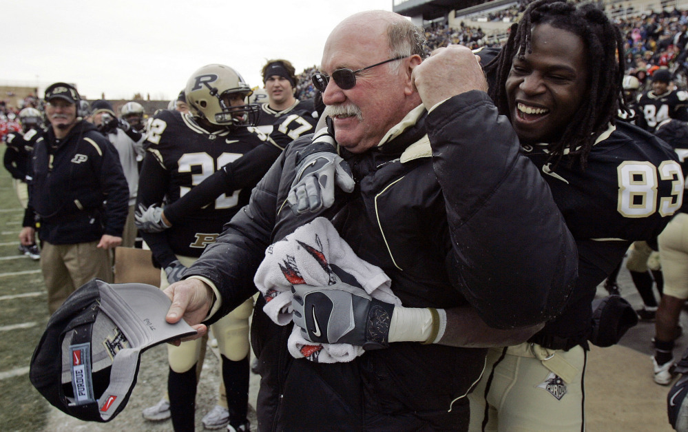 Postgame celebrations became common under the late Purdue football coach Joe Tiller, who compiled an 87-62 record with the Boilermakers between 1997 and 2008. Tiller died Saturday at 74 at his home in Wyoming.