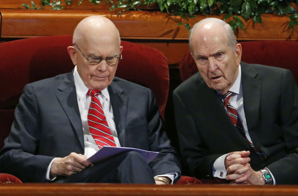 Dallin H. Oaks, left, and  Russell M. Nelson, members of the Twelve Apostles of The Church of Jesus Christ of Latter-day Saints, speak Saturday at the two-day conference.