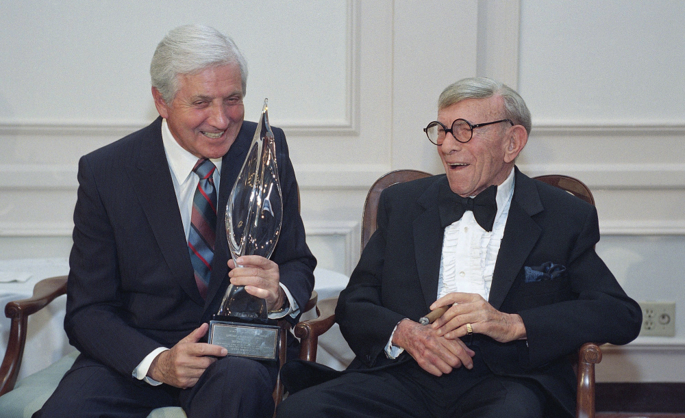 Monty Hall, left, recipient of the second George Burns Lifetime Award, laughs with George Burns at the United Jewish Fund tribute to Hall in 1993 in Los Angeles. 