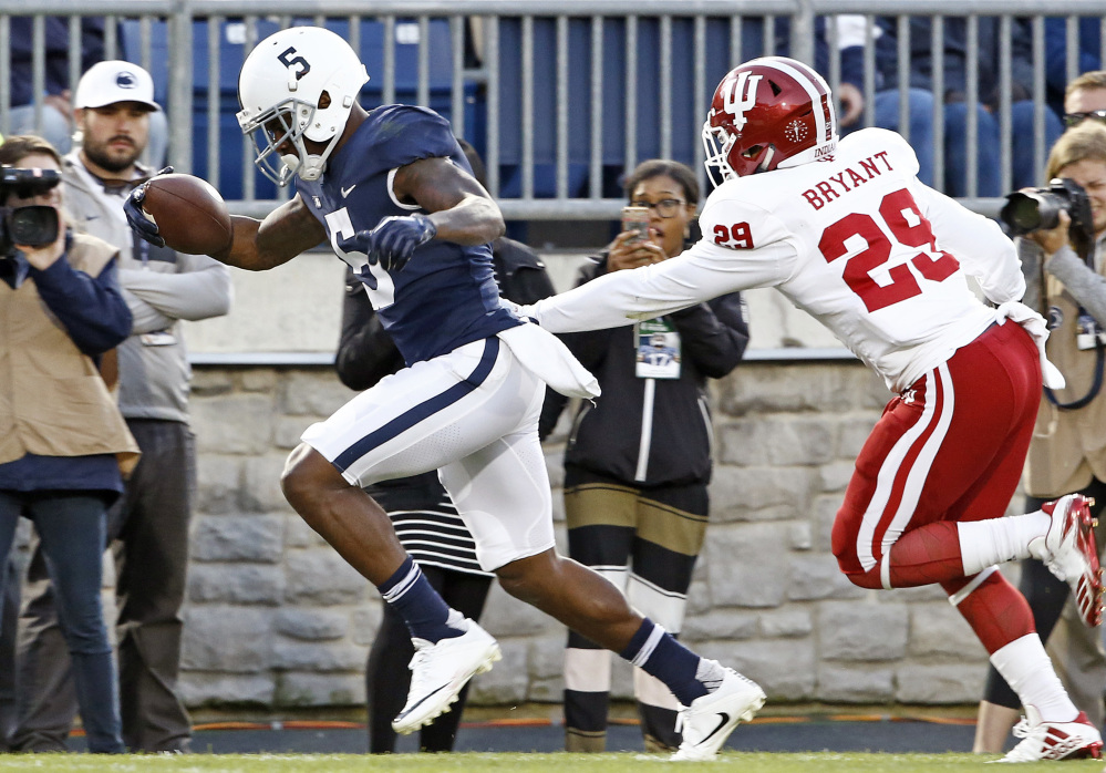 Penn State's DaeSean Hamilton scores one of his three receiving touchdowns, beating Indiana's Khalil Bryant into the end zone during the Nittany Lions' 45-14 win Saturday in State College, Pennsylvania. Hamilton had nine receptions.