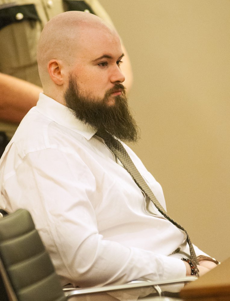 Leroy Smith III sits in a courtroom at Capital Judicial Center in Augusta on Jan. 20 during a hearing on his mental competence to be tried for murder in connection with the slaying and dismembering of his father in May 2014. Smith is scheduled to stand trial on Monday after pleading not criminally responsible to the killing.